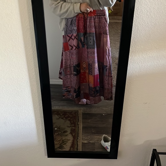 Long, thin, multicolored draw string skirt. It’s made for smaller waists. - Picture 2 of 3